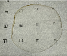 Fig4. Bioplastic film made from animal gelatin and cornstarch mix shows positive transparency features, as the letters behind the biofilm appear as if there was no biofilm covering them.